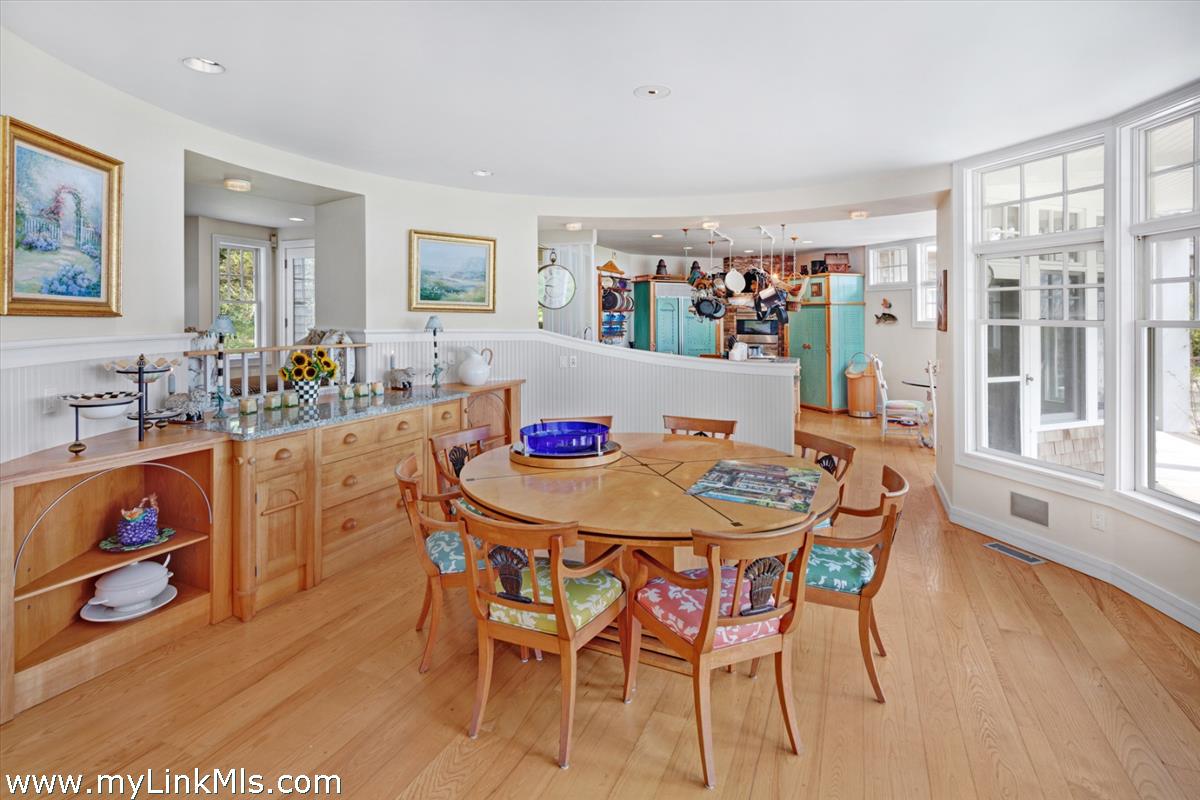 32 Boldwater Road Edgartown, MA 02539 - Photo 22 of 55 a dining room with furniture and wooden floor