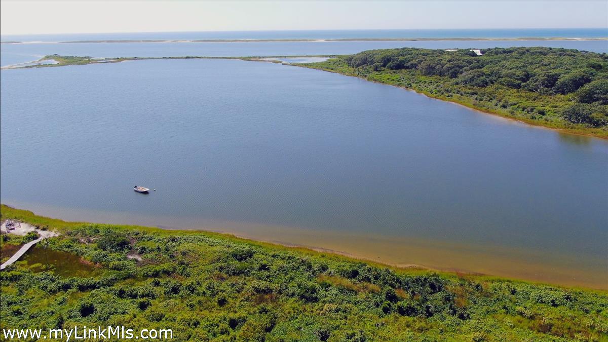 32 Boldwater Road Edgartown, MA 02539 - Photo 3 of 55 a view of a lake and a mountain
