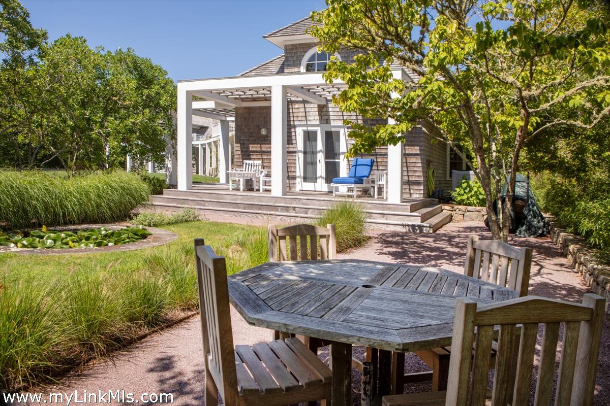 32 Boldwater Road Edgartown, MA 02539 - Photo 33 of 55 a view of a house with backyard and sitting area