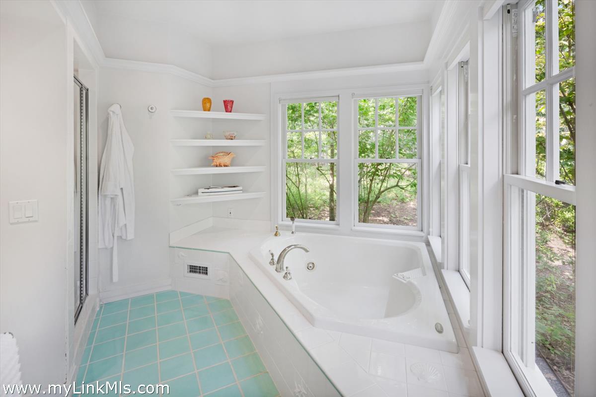 32 Boldwater Road Edgartown, MA 02539 - Photo 34 of 55 a bathroom with a bathtub and a shower