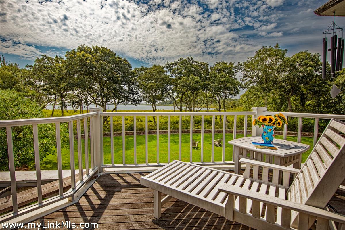 32 Boldwater Road Edgartown, MA 02539 - Photo 42 of 55 a view of a chairs and table in the balcony
