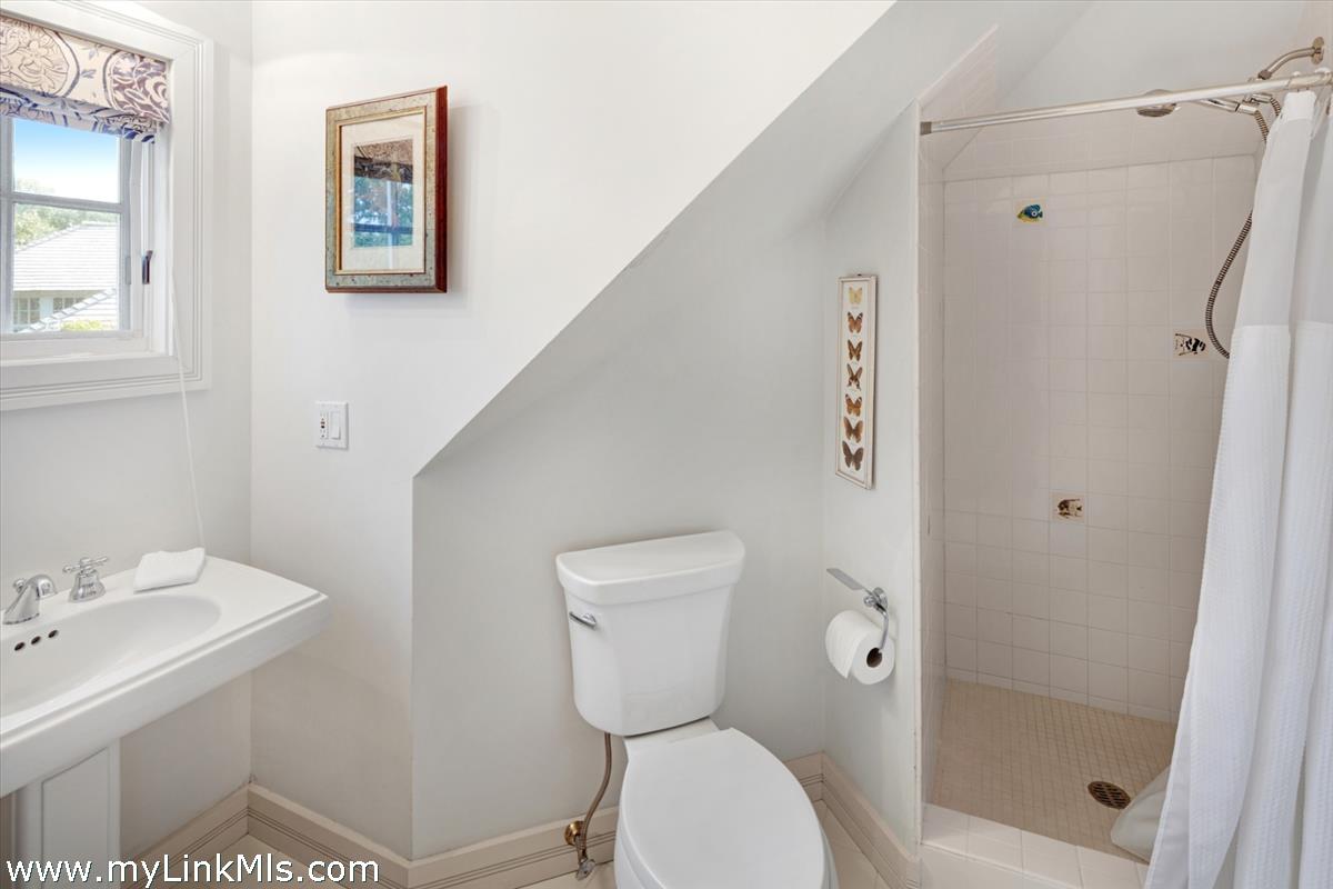32 Boldwater Road Edgartown, MA 02539 - Photo 52 of 55 a bathroom with a toilet sink and shower