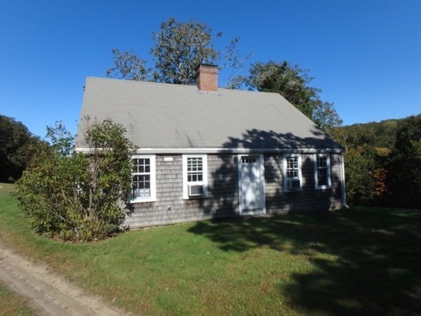 76 Ben Chase Road West Tisbury, MA 02568 - Photo 15 of 20 a view of house with yard and green space