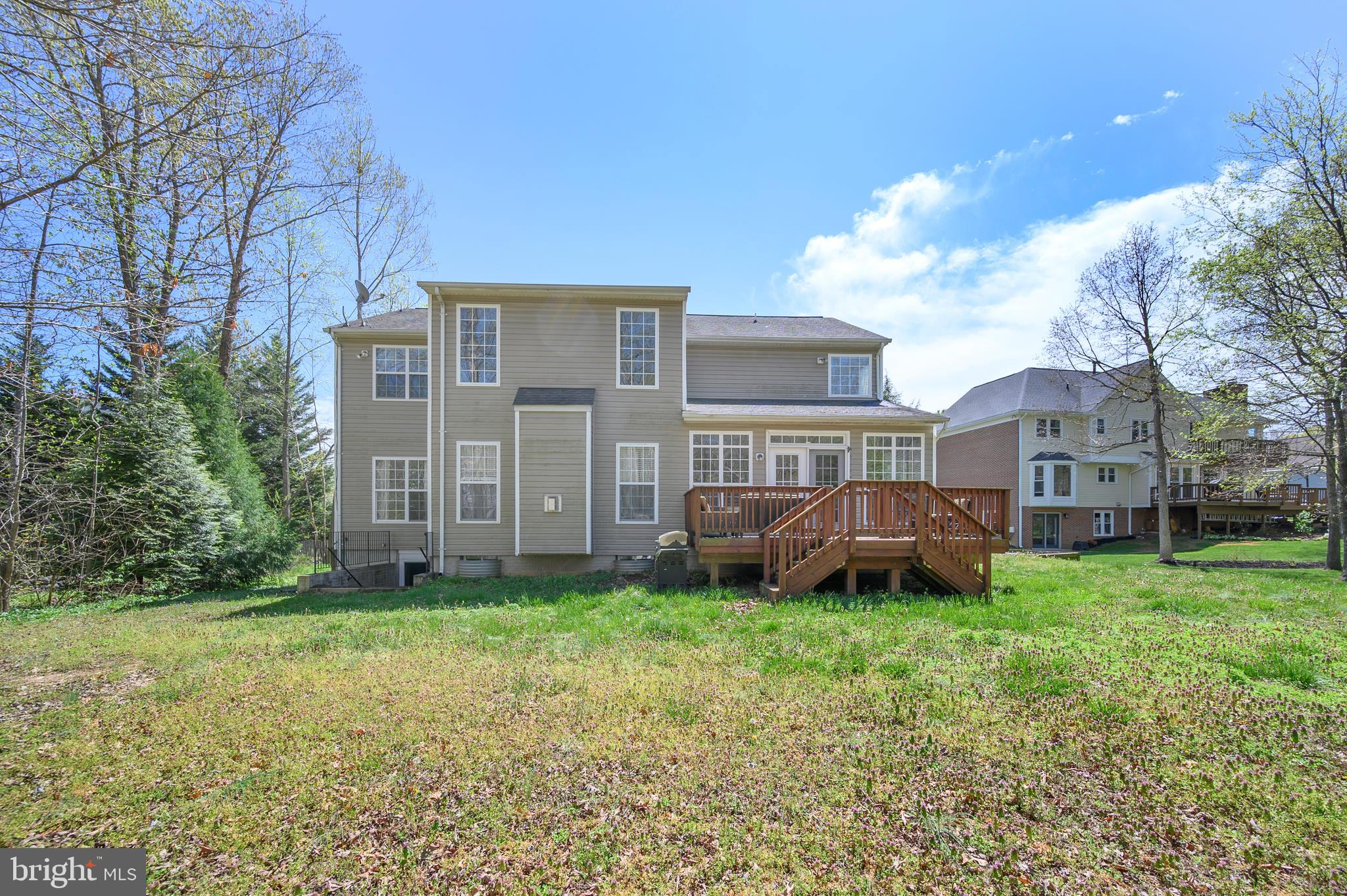 4222 Artillery Ridge Road Fredericksburg, VA 22408 - Photo 5 of 46 Back of house with deck and flat backyard