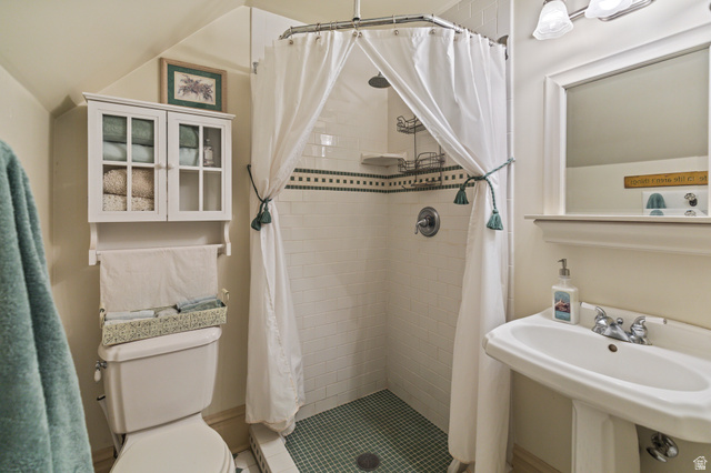 390 North 100 West Monroe, UT 84754 - Photo 84 of 167 Bathroom with a shower stall, vaulted ceiling, and light tile patterned floors
