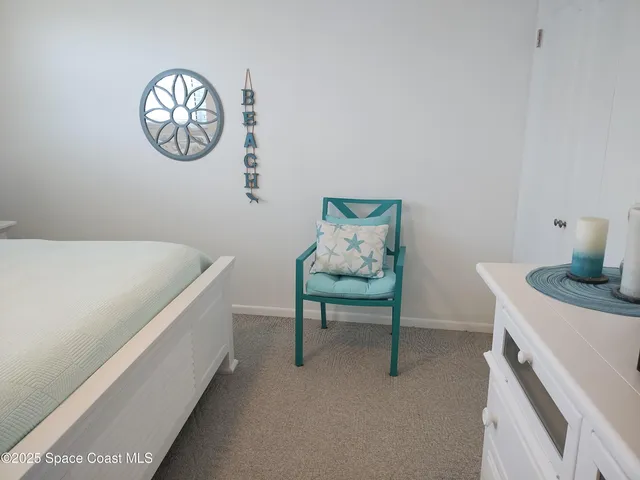 a bathroom with a tub shower and sink
