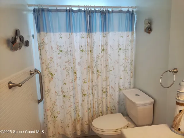 a view of a building with a garden