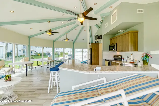 a view of a swimming pool with a terrace