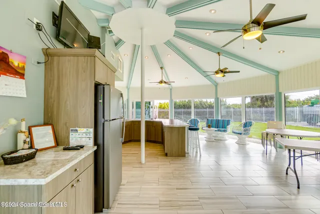 a view of a swimming pool with a yard