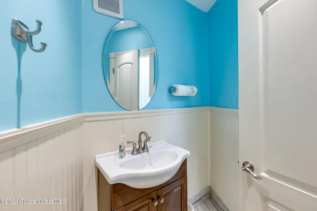 a terrace with a table and chairs