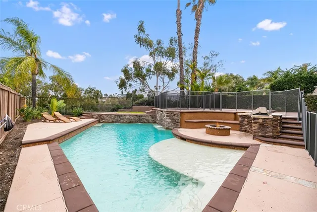 a view of a chairs and table in patio