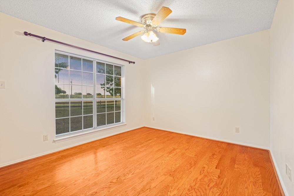 9861 Jim Christal Road Denton, TX 76249 - Photo 16 of 35 Secondary bedroom