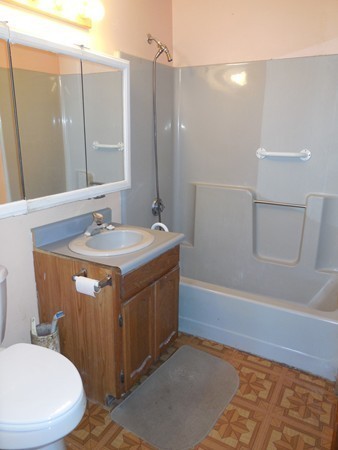 27 Upper Palmer Road Monson, MA 01057 - Photo 16 of 25 a bathroom with a sink a toilet and shower