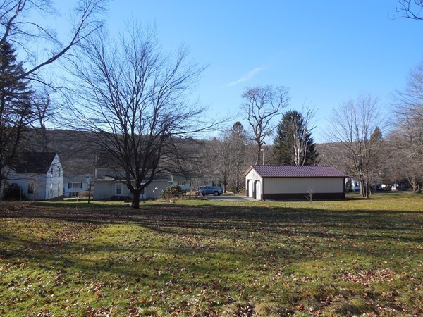 27 Upper Palmer Road Monson, MA 01057 - Photo 8 of 25 a view of a lake with houses