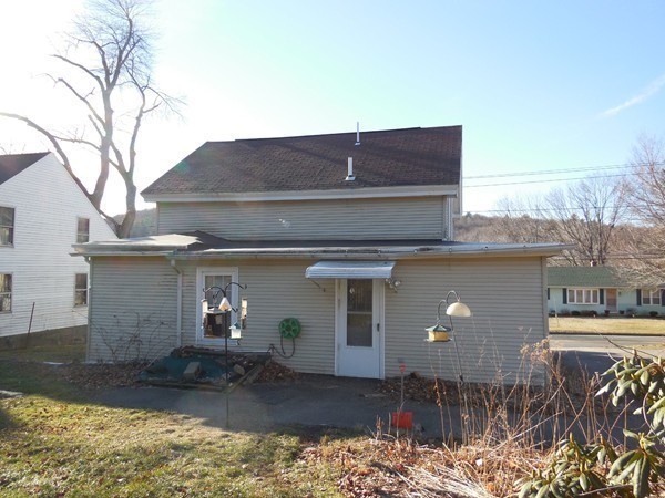 27 Upper Palmer Road Monson, MA 01057 - Photo 9 of 25 a front view of a house with a yard