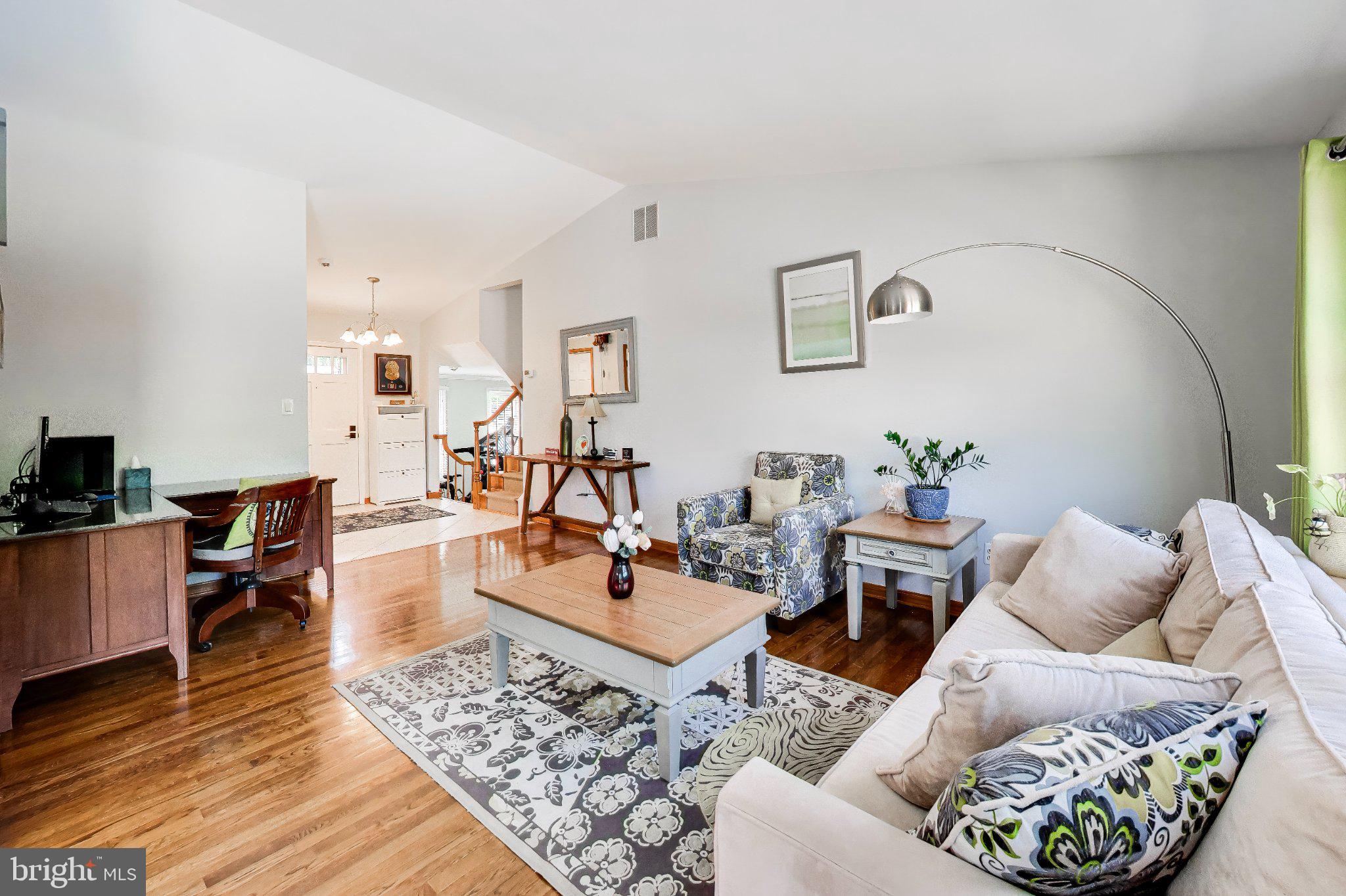 14216 Alderton Road Silver Spring, MD 20906 - Photo 18 of 63 a living room with furniture and wooden floor