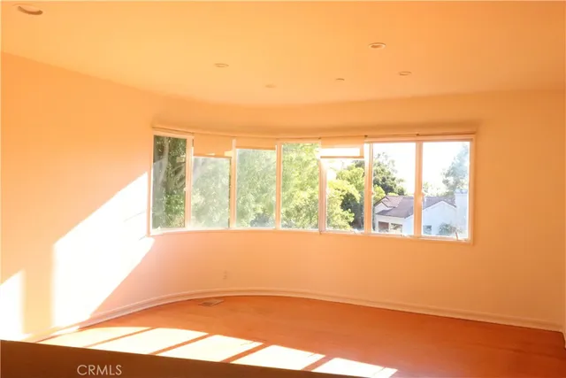 view of an empty room with a window