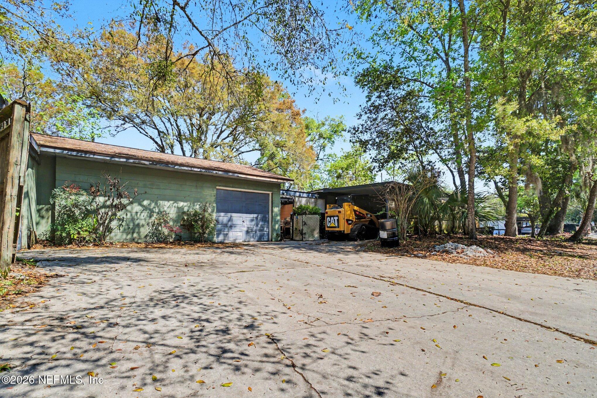 1826 Leon Road Jacksonville, FL 32246 - Photo 21 of 23 a view of a car parked in front of house