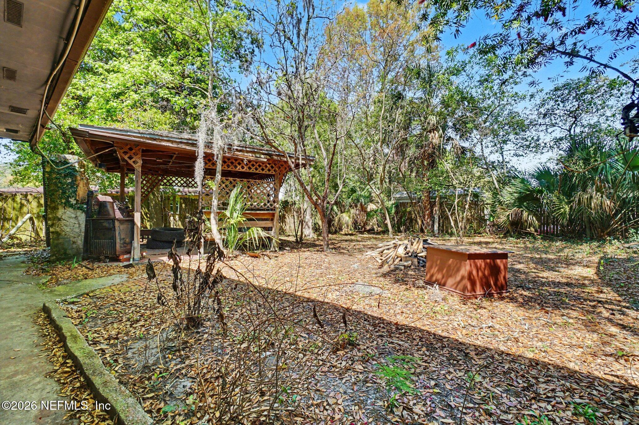 1826 Leon Road Jacksonville, FL 32246 - Photo 23 of 23 an outdoor space with seating