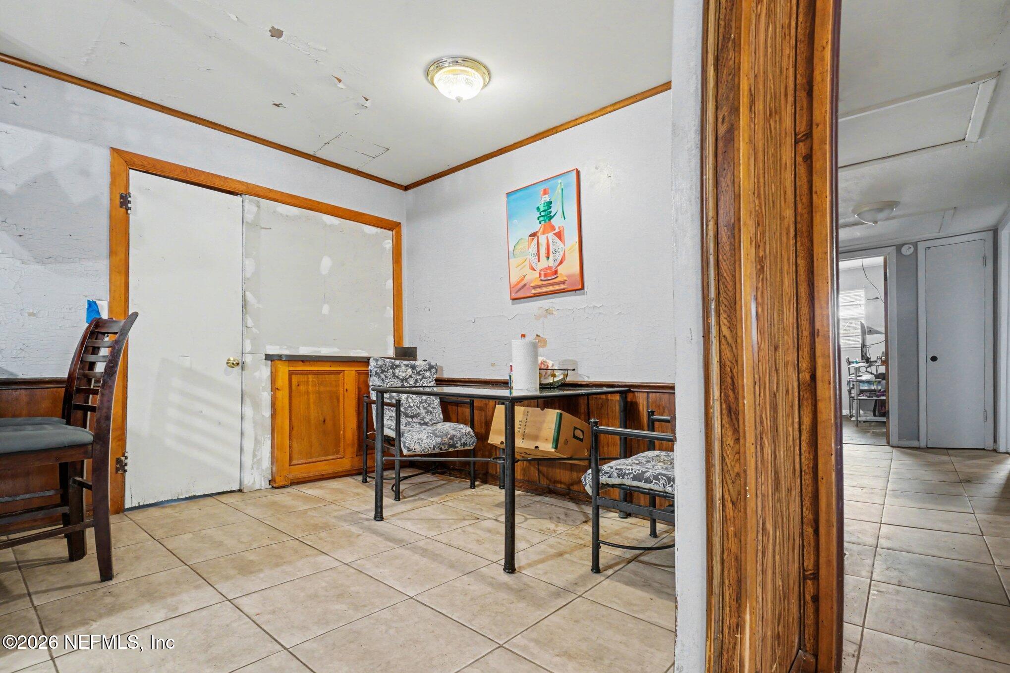 1826 Leon Road Jacksonville, FL 32246 - Photo 6 of 23 a workspace with furniture and bathroom