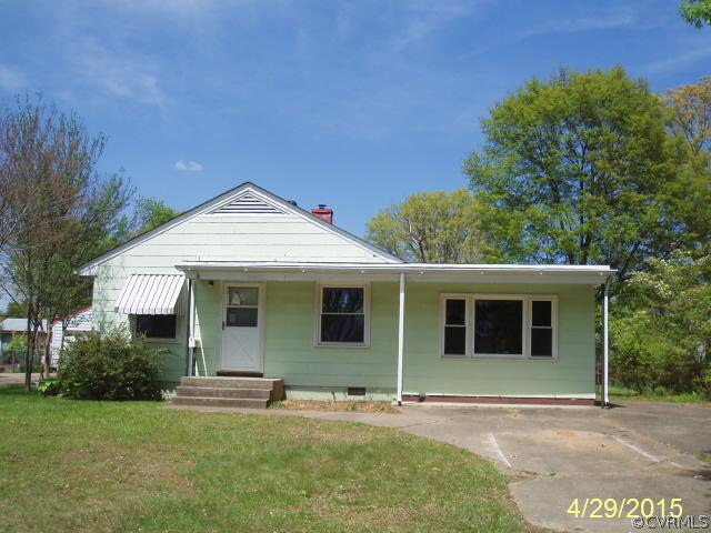 110 Wootton Road Sandston, VA 23150 - Photo 1 of 10 a front view of a house with a garden