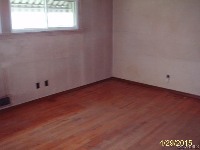 110 Wootton Road Sandston, VA 23150 - Photo 5 of 10 an empty room with a window