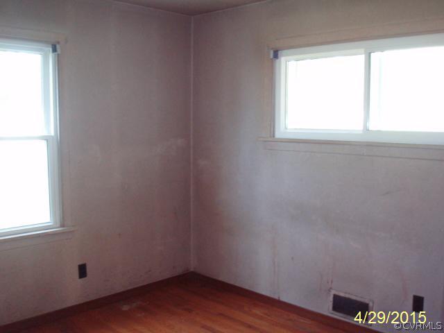 110 Wootton Road Sandston, VA 23150 - Photo 9 of 10 an empty room with a window