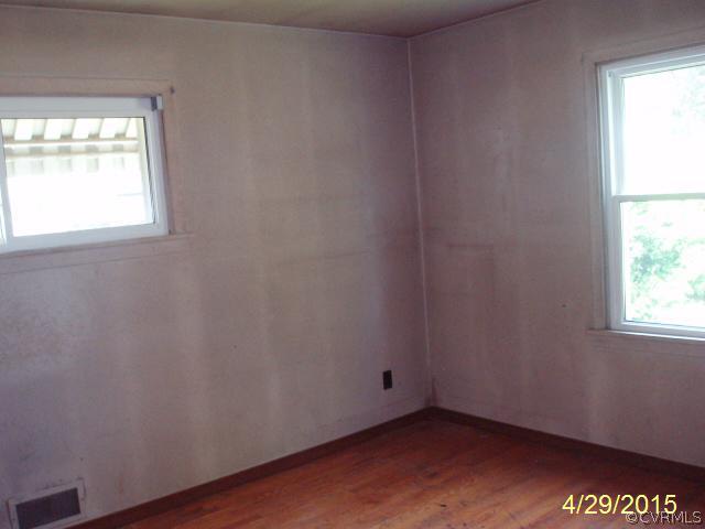 110 Wootton Road Sandston, VA 23150 - Photo 10 of 10 an empty room with a window