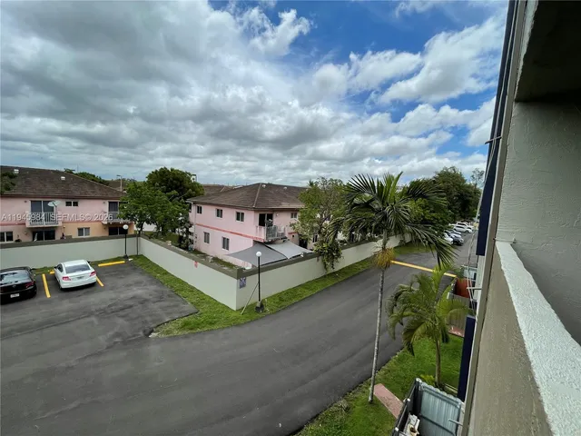 a terrace with outdoor seating and city view
