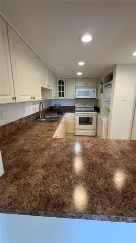 an empty room with a mirror