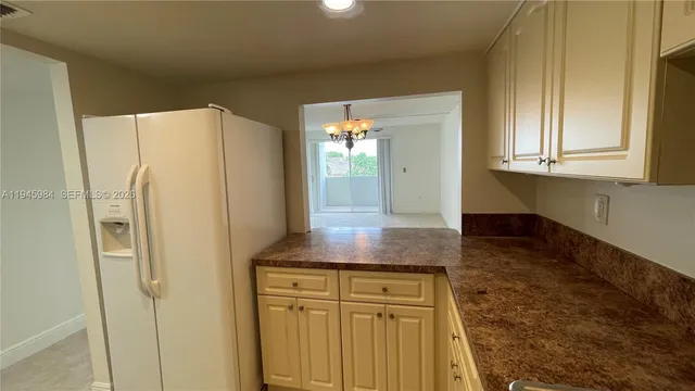 a kitchen with a stove and a sink