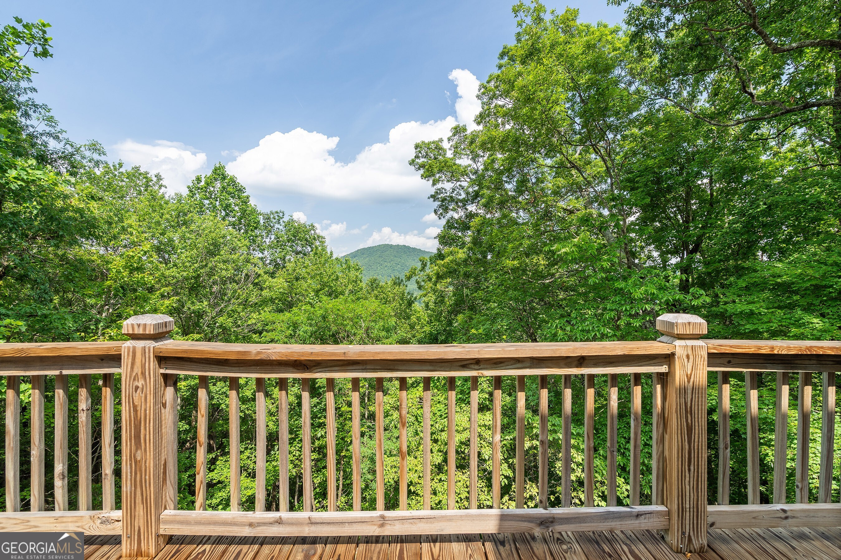 832 Round Top Drive Clayton, GA 30525 - Photo 16 of 42 a city view from a balcony