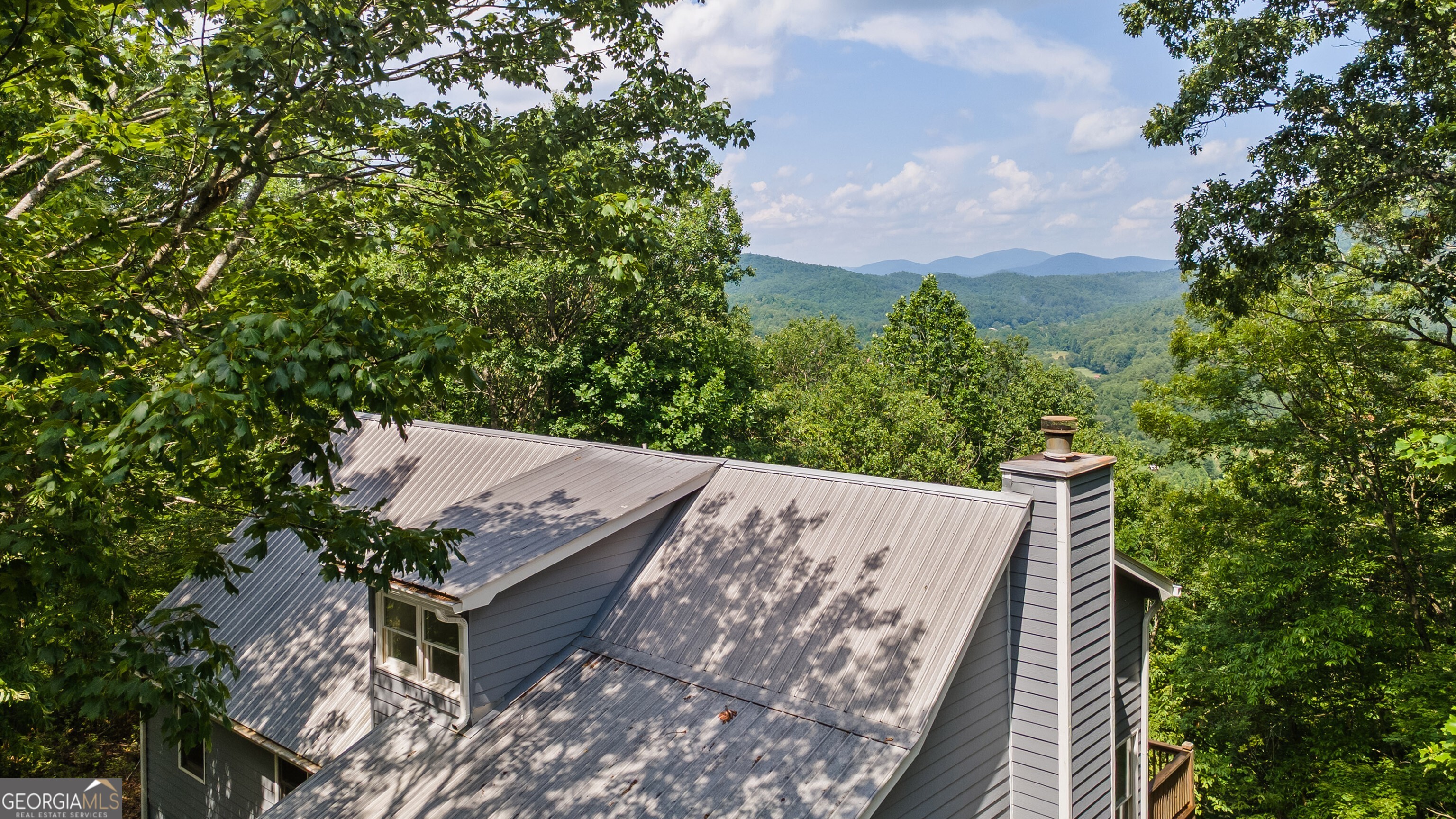 832 Round Top Drive Clayton, GA 30525 - Photo 2 of 42 a view of a balcony with an outdoor space