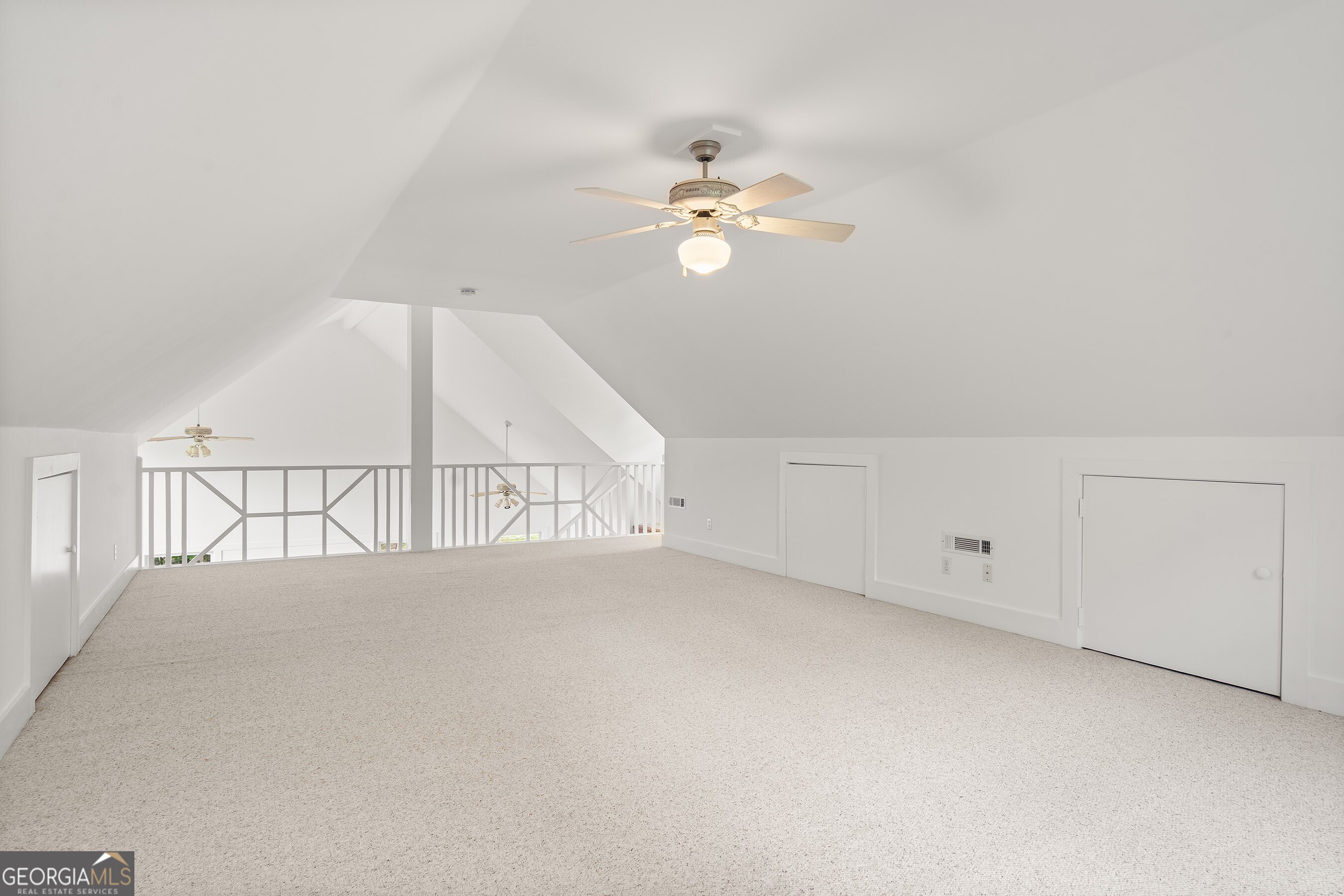 832 Round Top Drive Clayton, GA 30525 - Photo 26 of 42 an empty room with chandelier fan