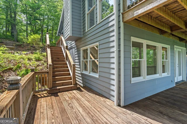 a view of a porch with a bench