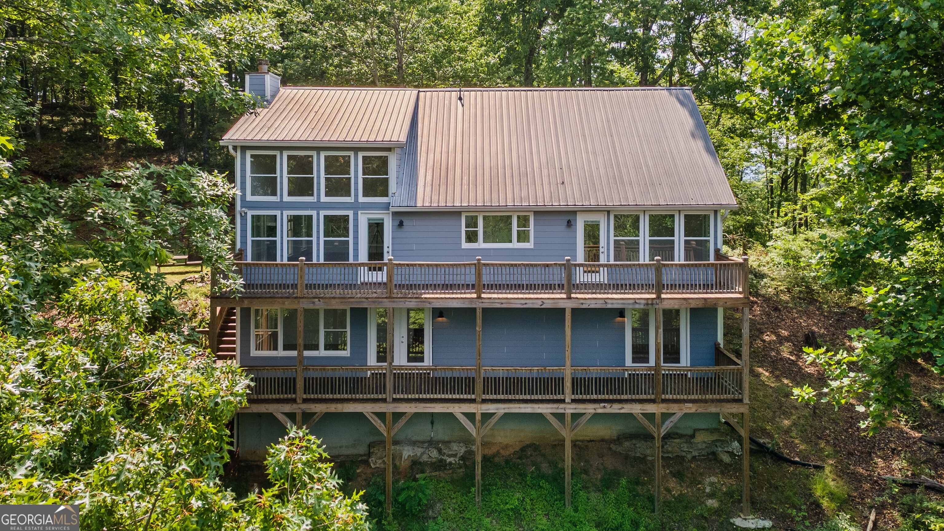832 Round Top Drive Clayton, GA 30525 - Photo 37 of 42 a aerial view of a house with roof deck