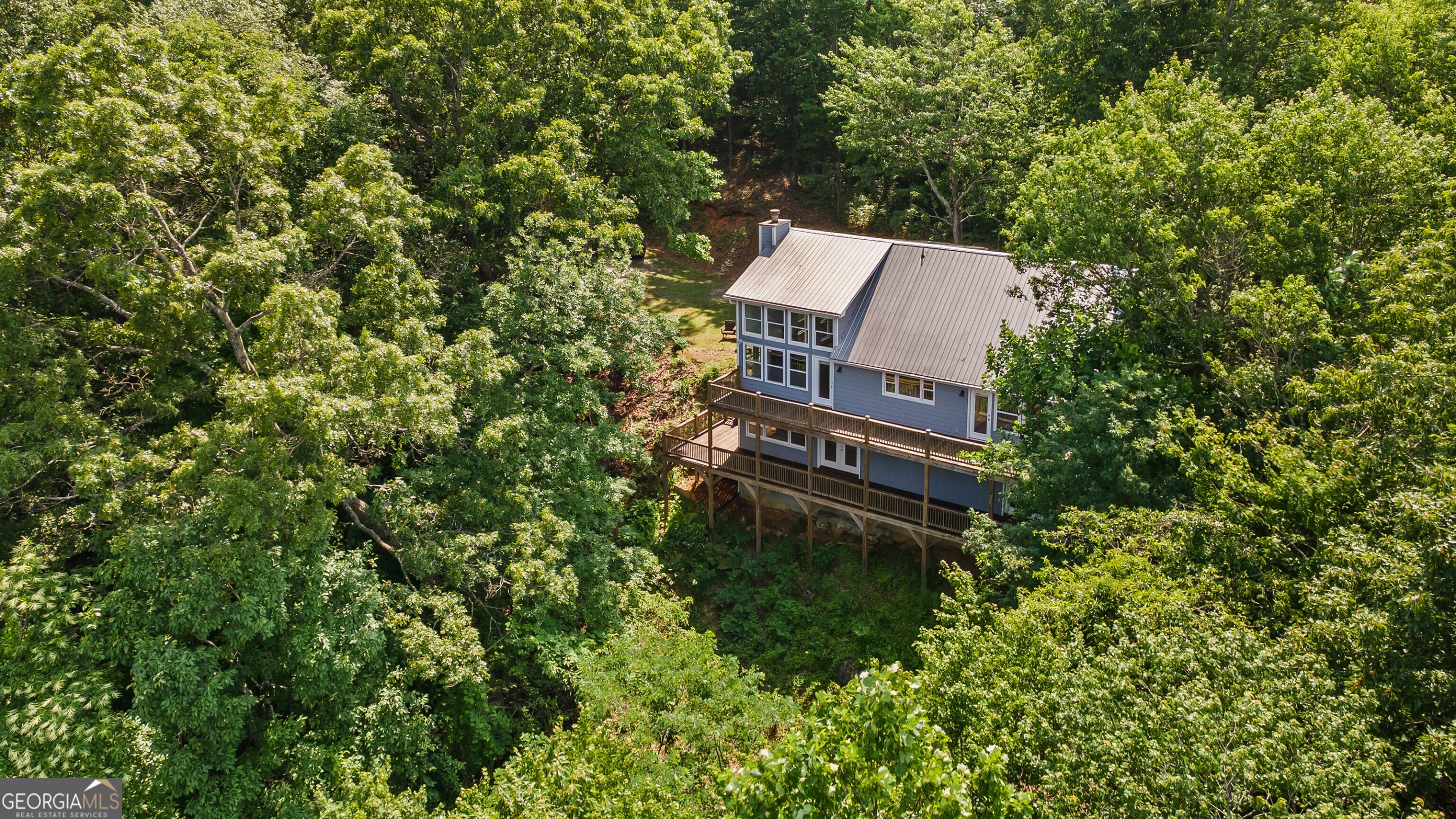 832 Round Top Drive Clayton, GA 30525 - Photo 39 of 42 a view of a house with a tree