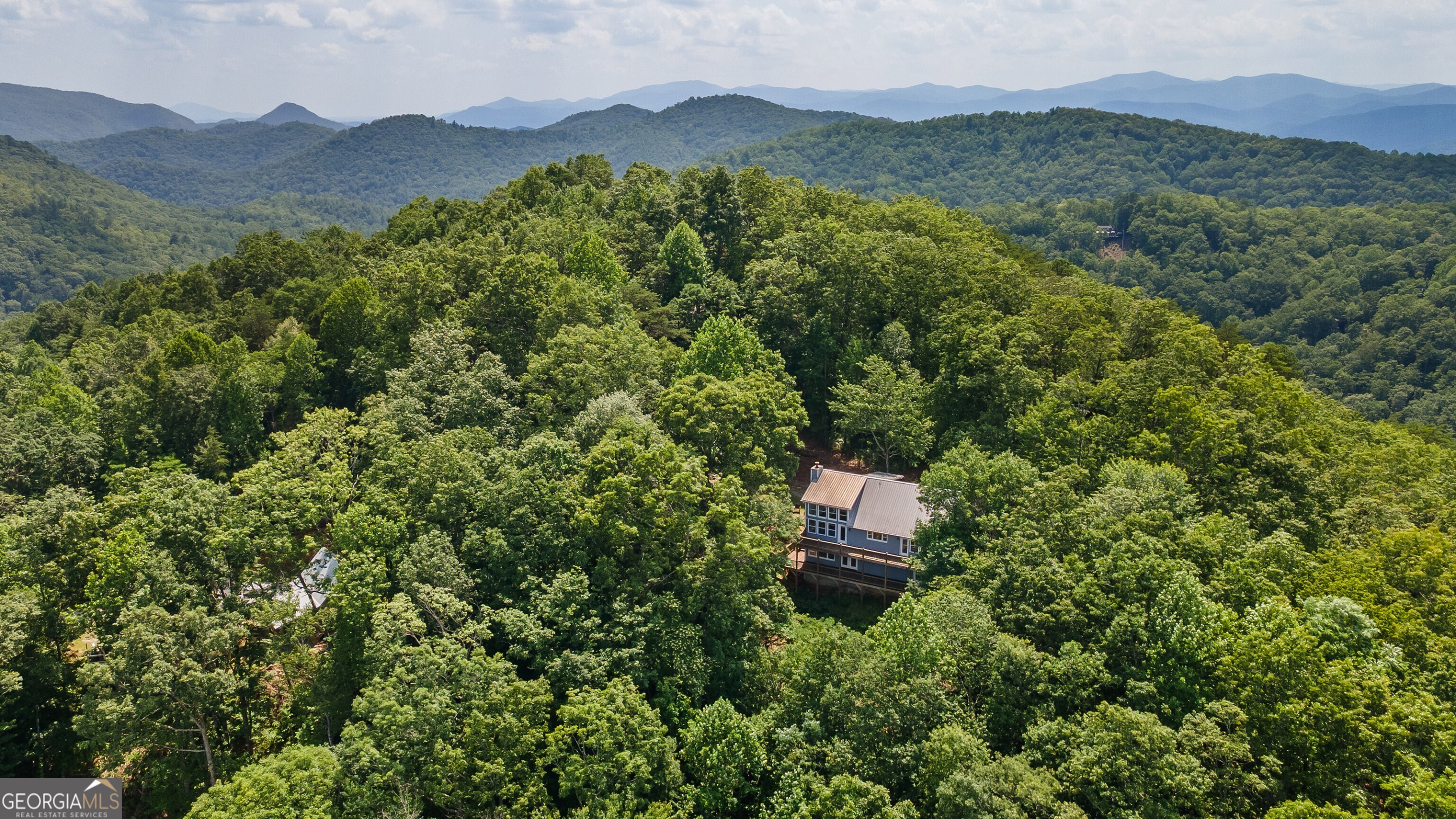 832 Round Top Drive Clayton, GA 30525 - Photo 40 of 42 an aerial view of a house with a yard