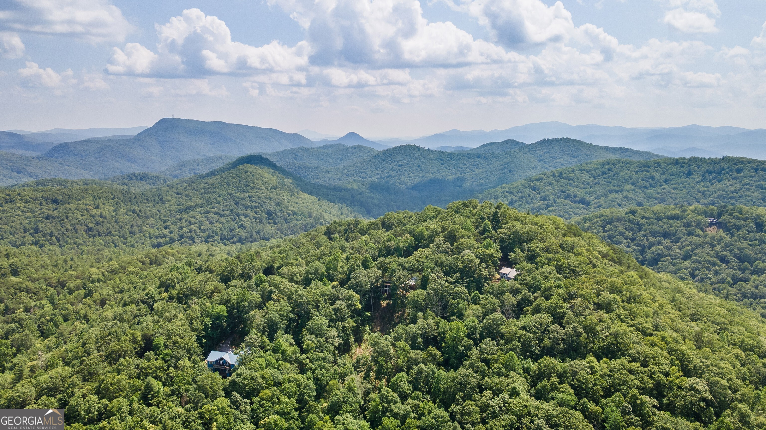 832 Round Top Drive Clayton, GA 30525 - Photo 41 of 42 a view of a lush green mountain in the distance
