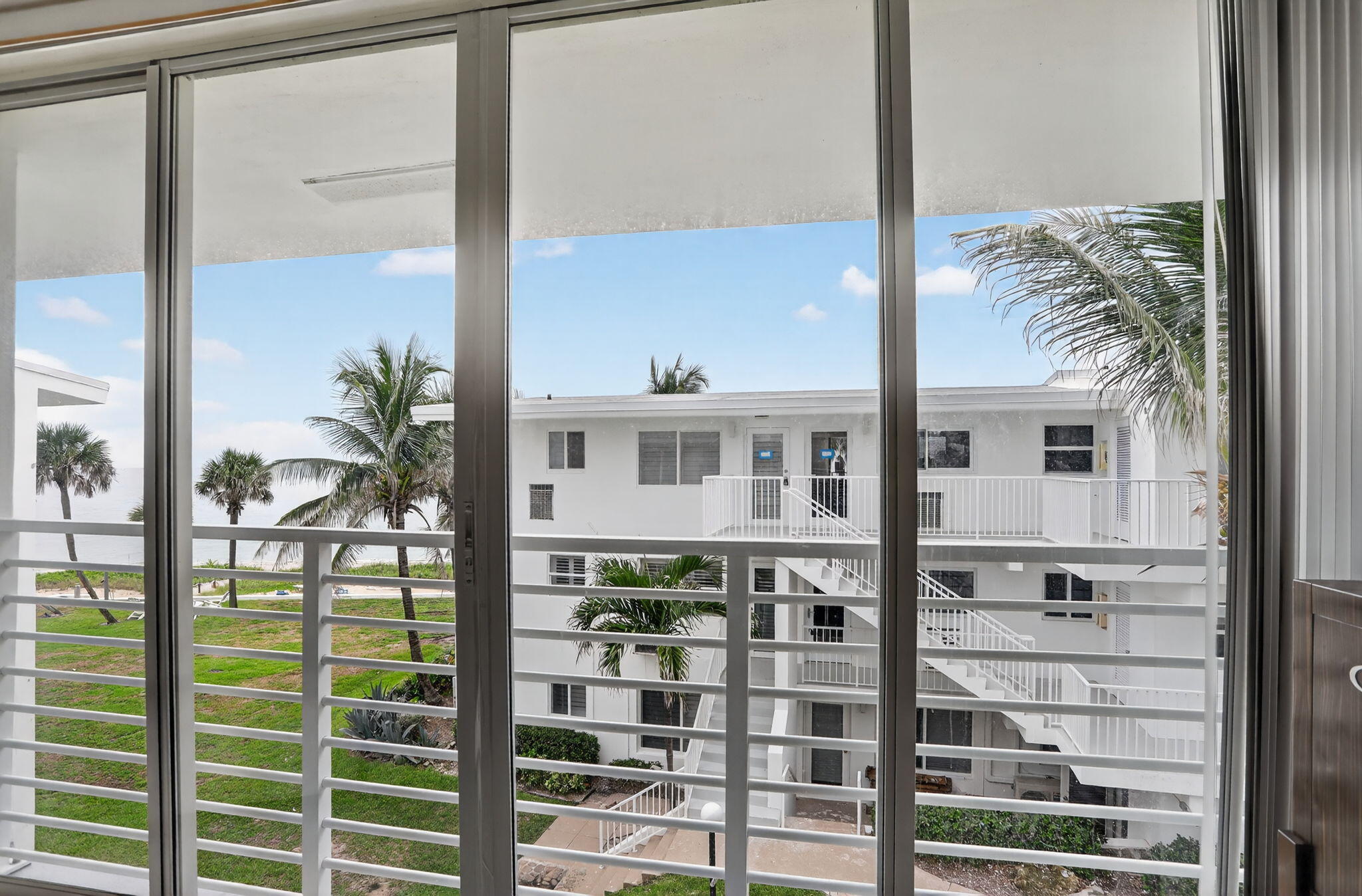 1043 Hillsboro Mile, Unit 22C Hillsboro Beach, FL 33062 - Photo 22 of 53 a view of a balcony with a ocean view