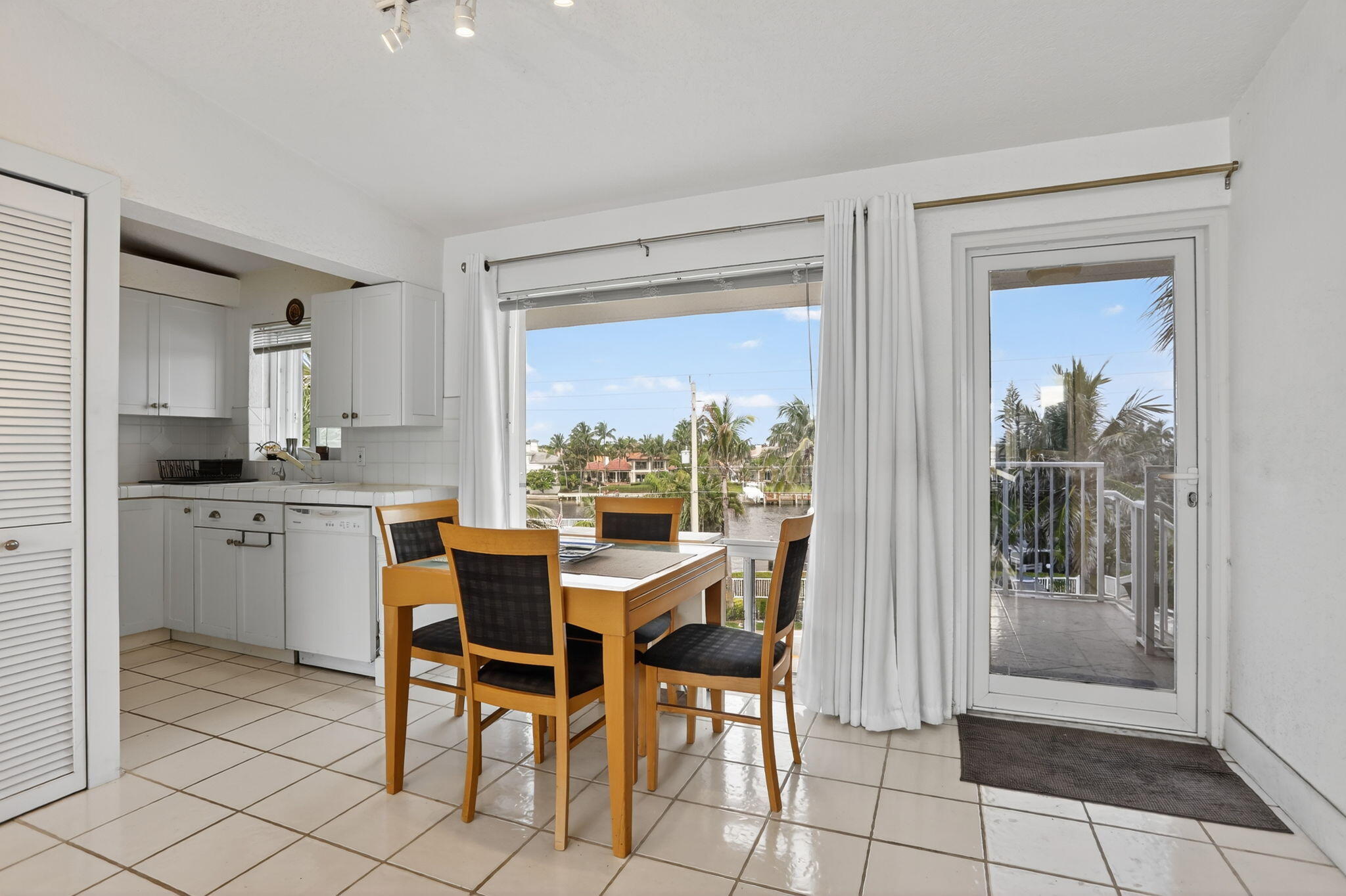 1043 Hillsboro Mile, Unit 22C Hillsboro Beach, FL 33062 - Photo 4 of 53 a dining room with furniture and window