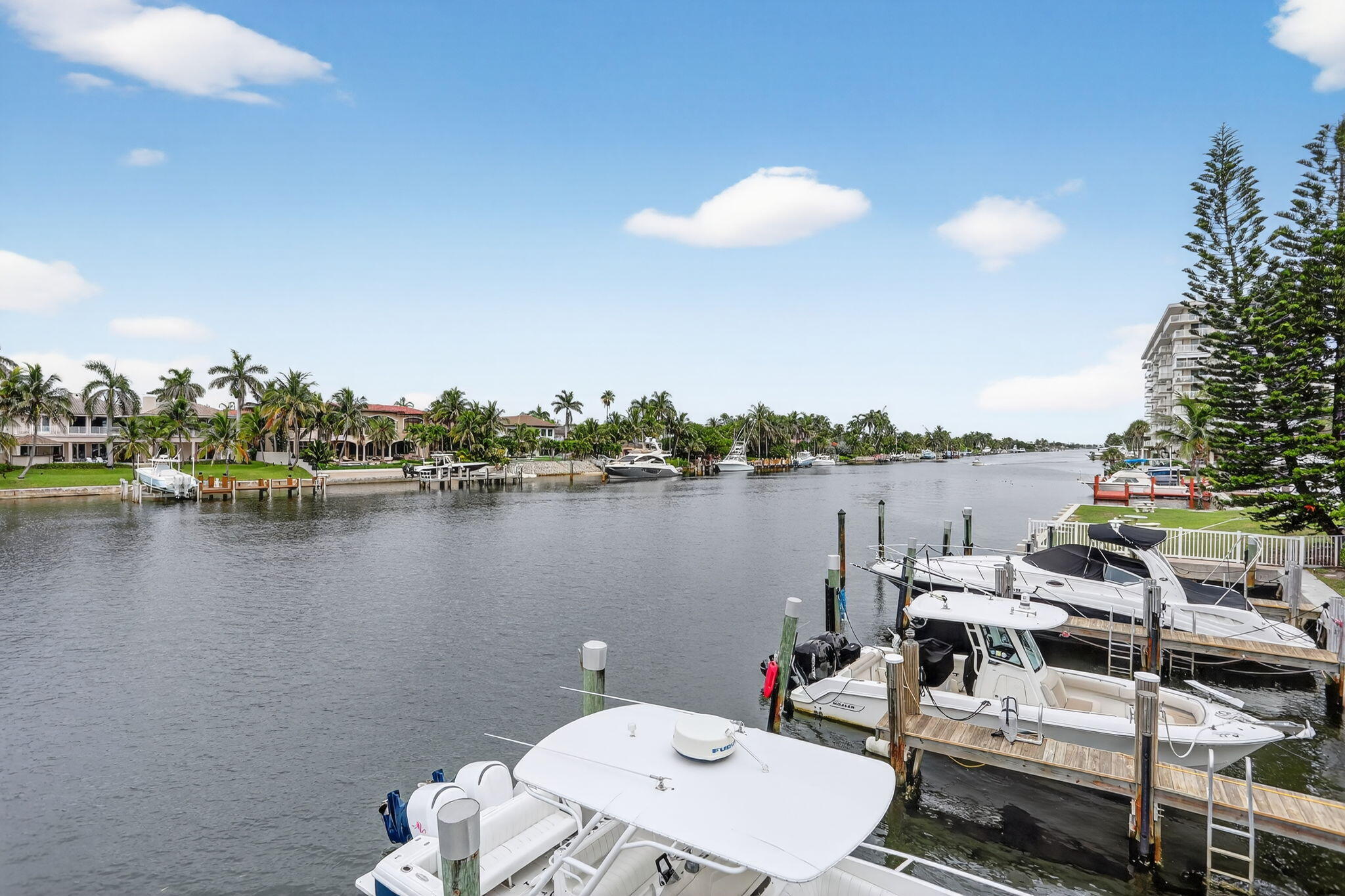 1043 Hillsboro Mile, Unit 22C Hillsboro Beach, FL 33062 - Photo 45 of 53 a view of a lake with couches chairs and city view