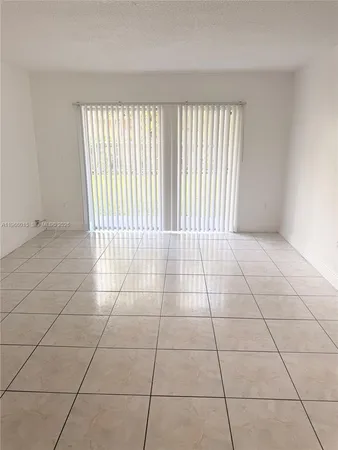 a view of a livingroom with an window