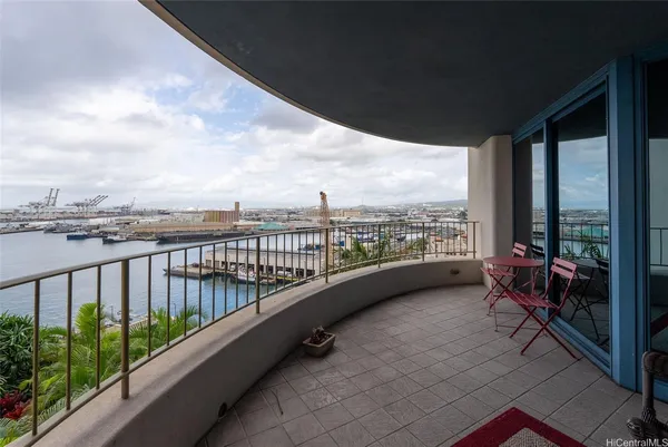 a view of balcony with furniture