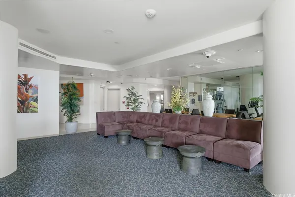 a living room with furniture and a couch