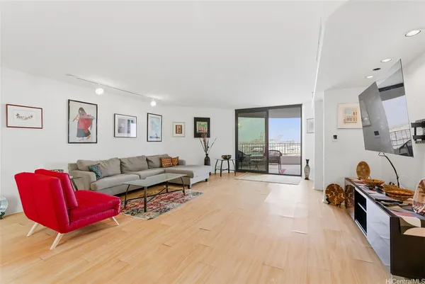 a living room with furniture window and a table