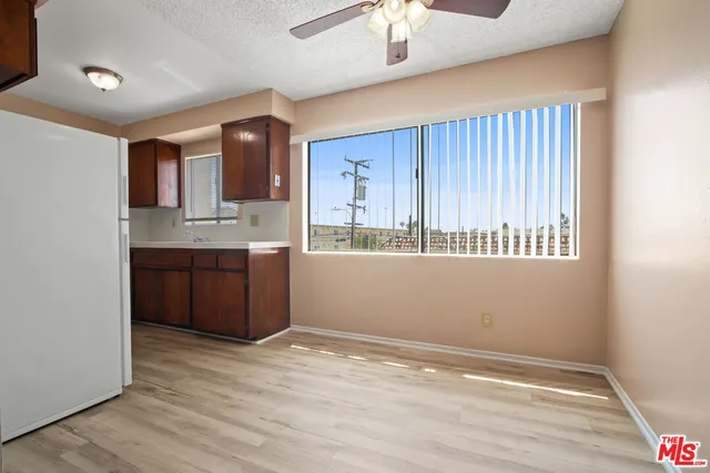 a view of kitchen with wooden floor