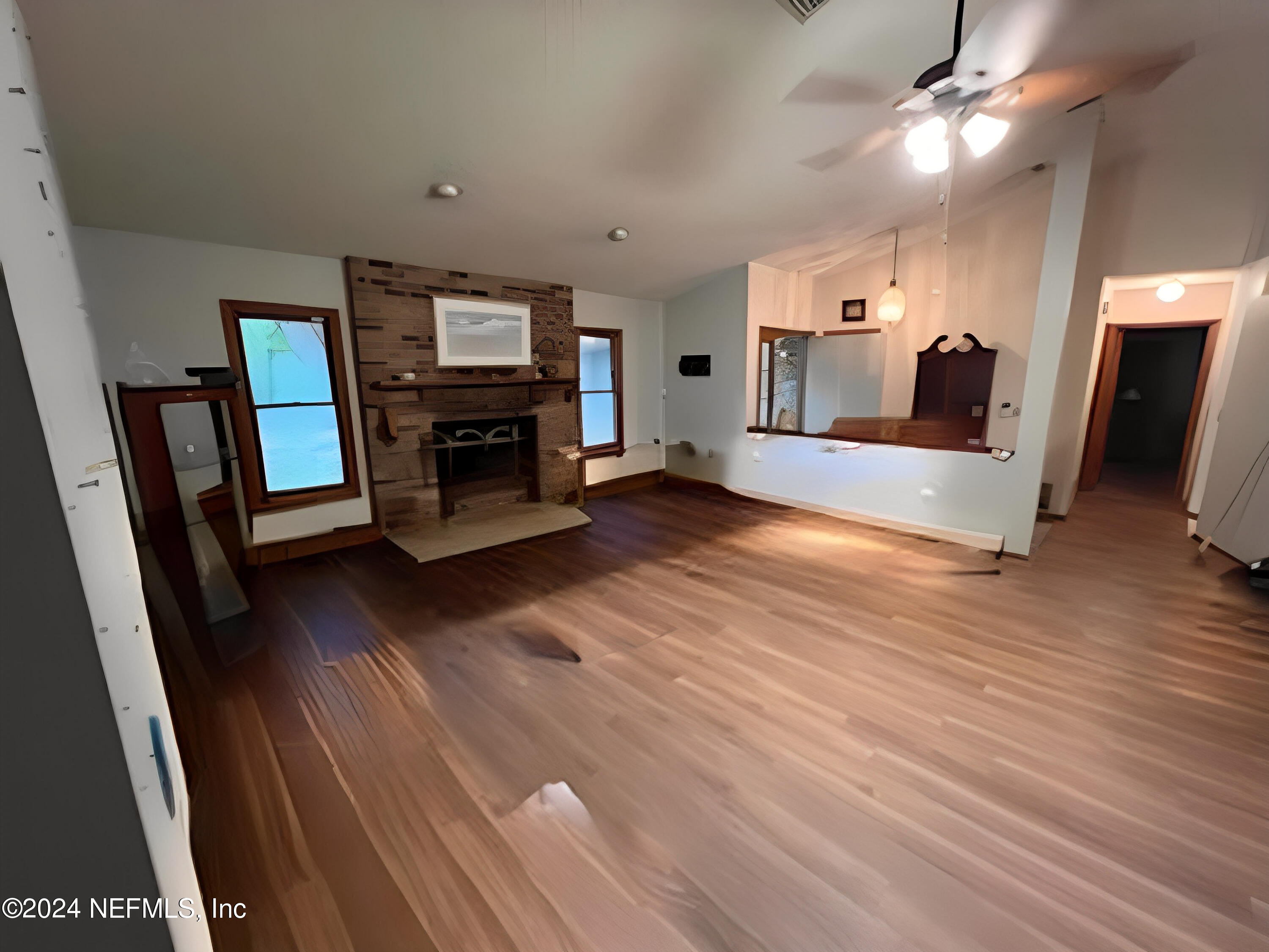 29 Sea Oaks Drive St. Augustine, FL 32080 - Photo 3 of 5 a view of a livingroom with furniture hardwood floor and a ceiling fan