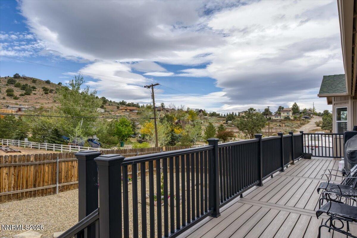 15770 Rocky Vista Road Reno, NV 89521 - Photo 47 of 68 a view of a balcony with wooden floor