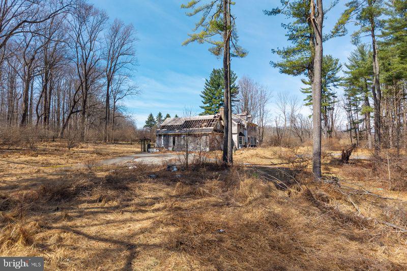 1004 Garrett Mill Road Newtown Square, PA 19073 - Photo 13 of 16 Forgotten charm in nature's embrace.